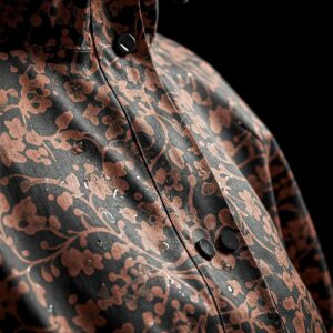 Close-up view of the intricate raincoat factor pattern texture.