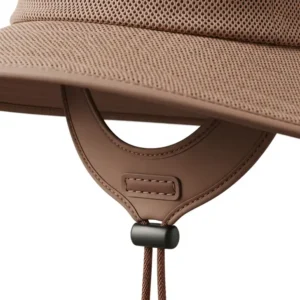 Illustrated close-up of a women's hike hat highlighting its breathable material and secure adjustable chin strap for outdoor comfort