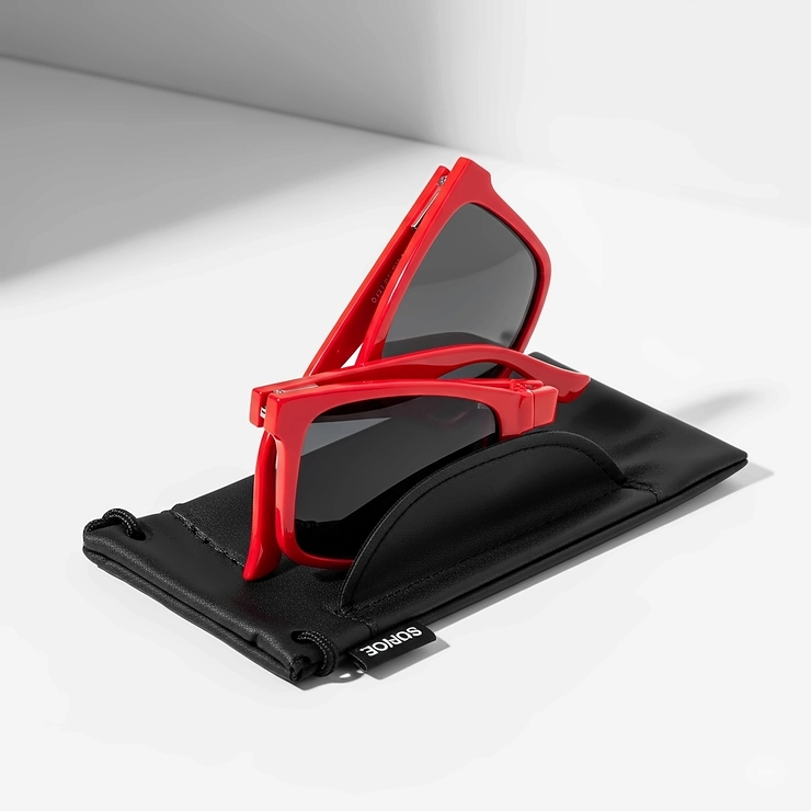 Innovative folding red ladies sunglasses, demonstrating their portability and convenient storage.