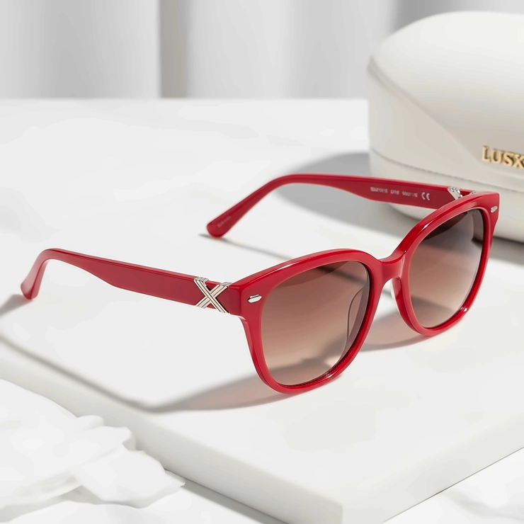 High-end red ladies sunglasses from a luxury brand, emphasizing quality craftsmanship and premium materials.