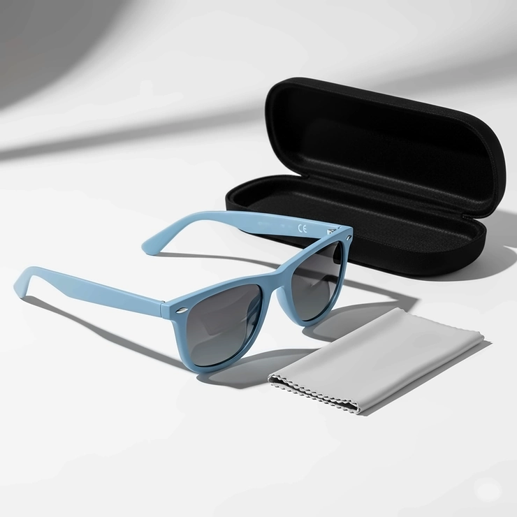 A product shot featuring a pair of light blue sunglasses alongside their protective case and a microfiber cleaning cloth.