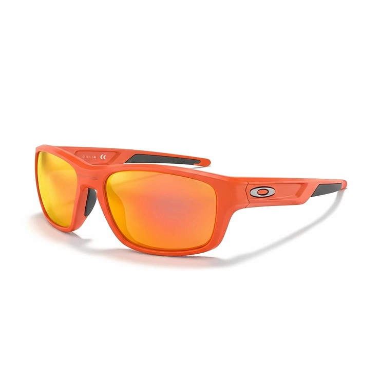 A clean, high-resolution product shot of orange Oakley sunglasses on a white background, showing the frame and lens in detail.