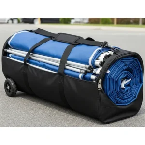 A 10x20 pop up canopy compactly packed inside its wheeled storage bag, ready for transport.