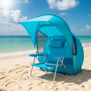 A vibrant blue beach chair with a built-in tent provides a shady spot on a sandy beach.