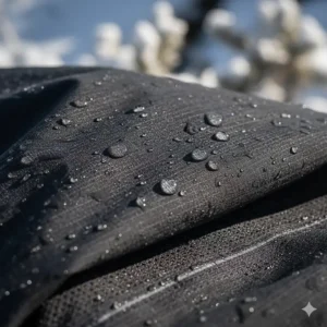 Close-up view of the breathable and waterproof fabric used in the men's winter running jacket.