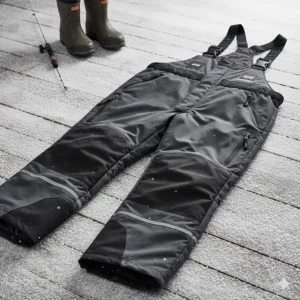 Heavy-duty insulated fishing bibs with reinforced knees for ice fishing and cold boat decks.
