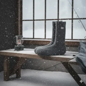 Thick merino wool socks designed to keep feet warm and dry in freezing temperatures.