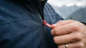 Detail view of a durable, water-resistant zipper on a fleece-lined jacket.