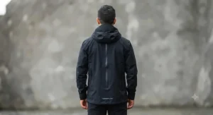 Back view of sleek black rain jacket for men