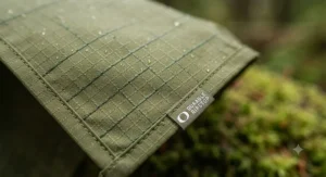Detailed view of the tear-resistant fabric used in a high-quality hiking rain poncho with hood